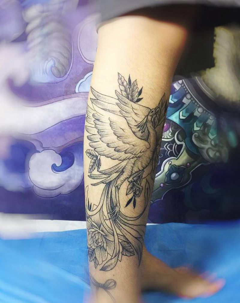 小腿凤凰恢复后纹身图片_腿部脚部点刺新传统纹身图案