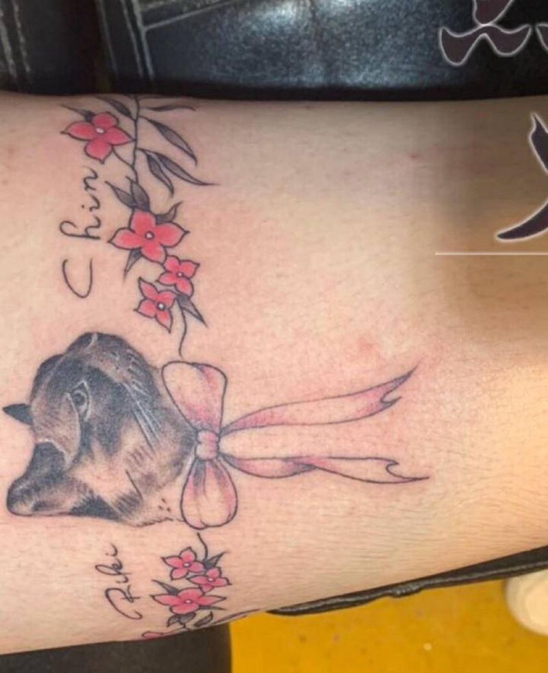 猫咪纹身图片_腿部点刺几何纹身图案