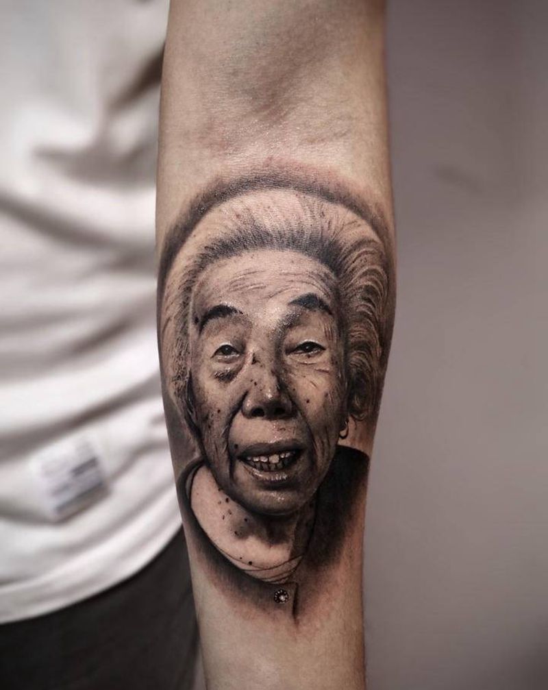 照片写实纹身图片_手部手臂欧美写实肖像人物写实纹身图案