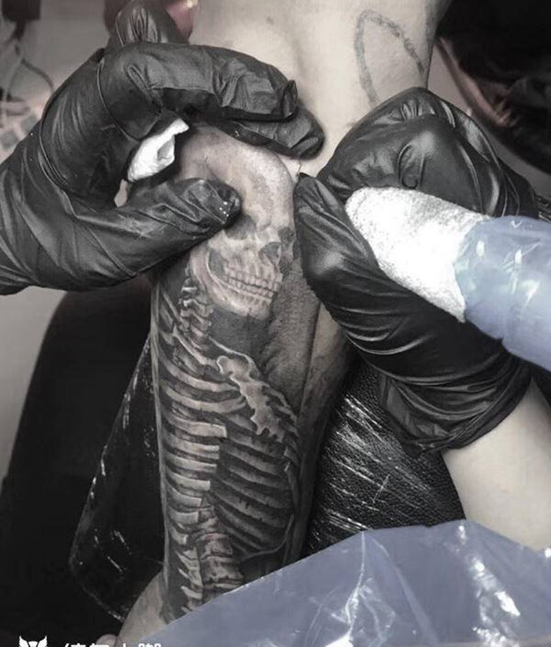 骷髅+恢复纹身图片_手臂欧美写实骷髅纹身图案
