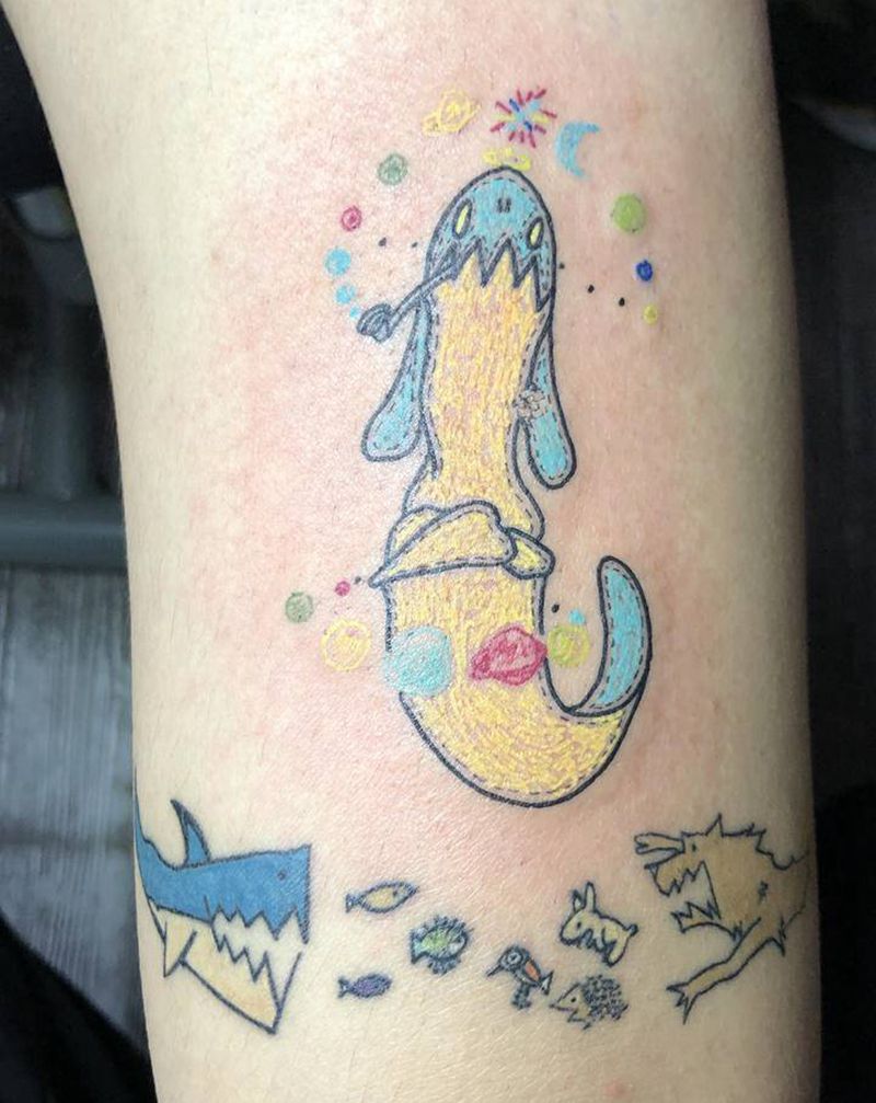 也是小图纹身图片_腿部纹身图案