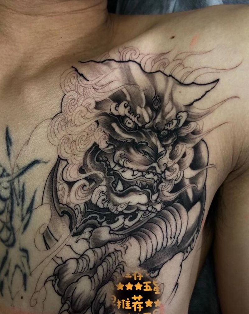 唐狮纹身图片_胸部老传统纹身图案