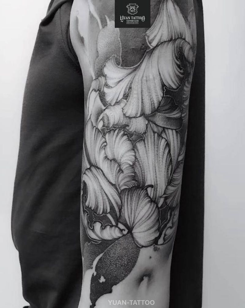 花臂纹身图片_手臂肩部点刺花纹身图案