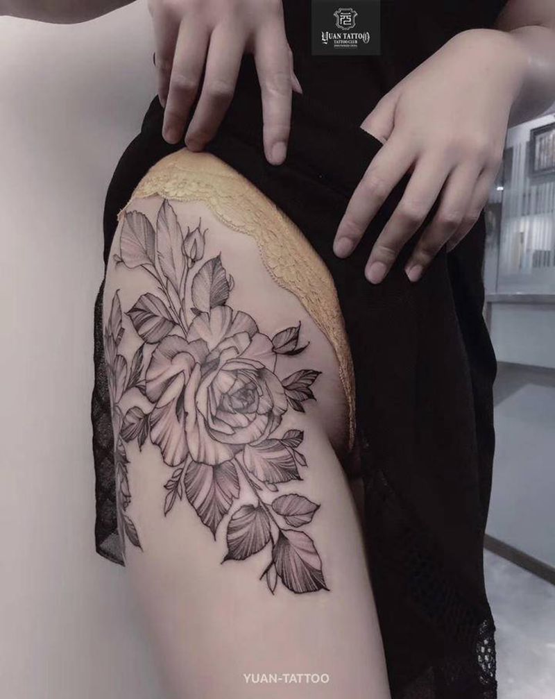 性感臀花纹身图片_臀部腿部点刺花卉线条纹身图案