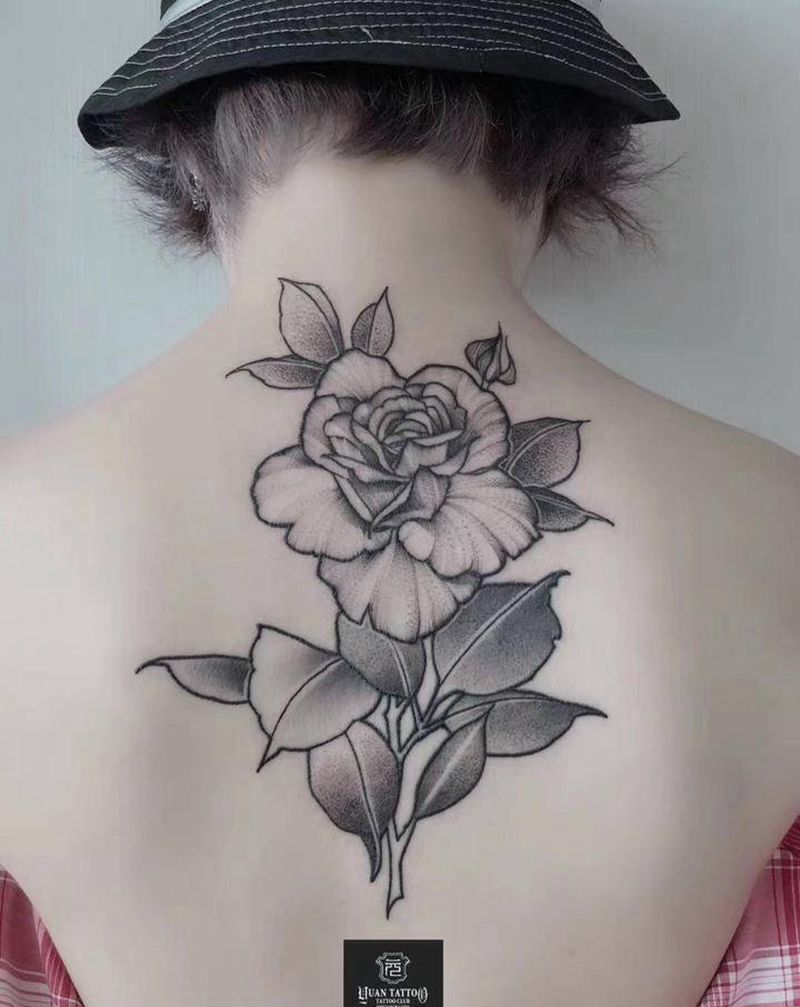 万花丛中，只取一束纹身图片_背部点刺花卉纹身图案