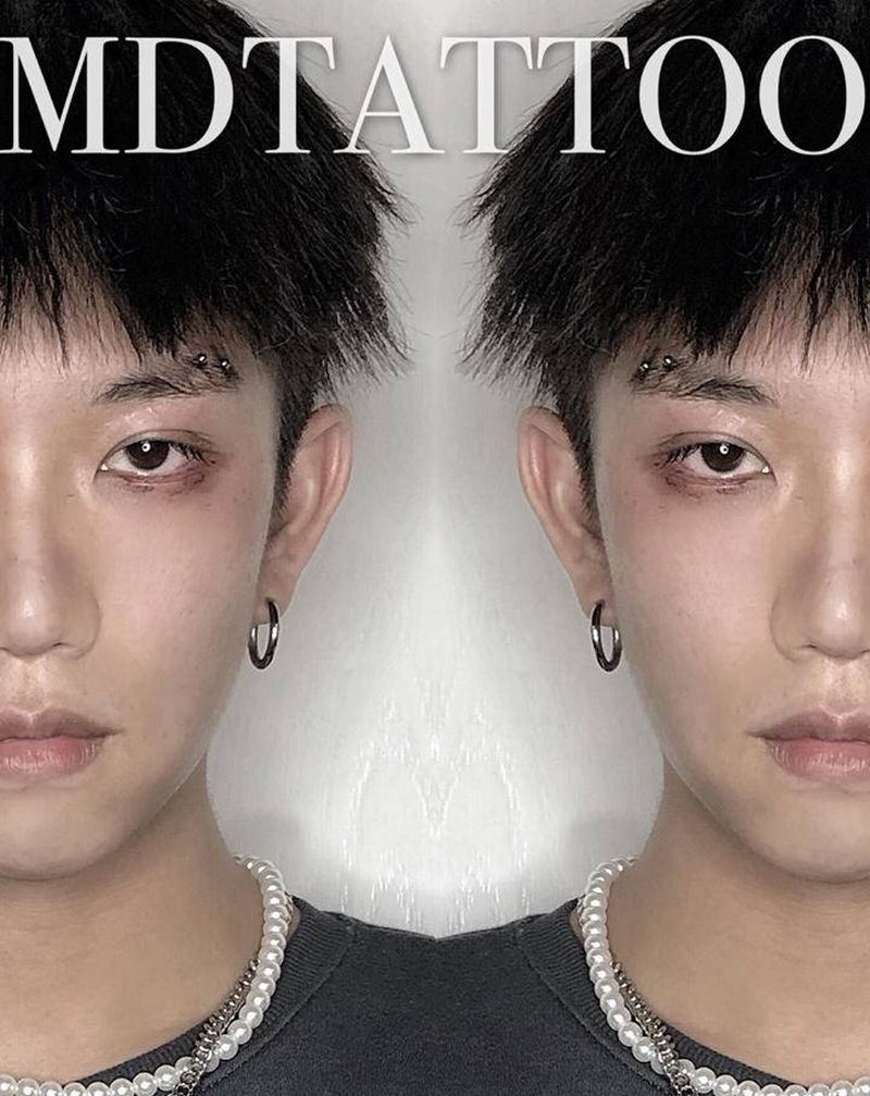 眉钉纹身图片_穿孔纹身图案