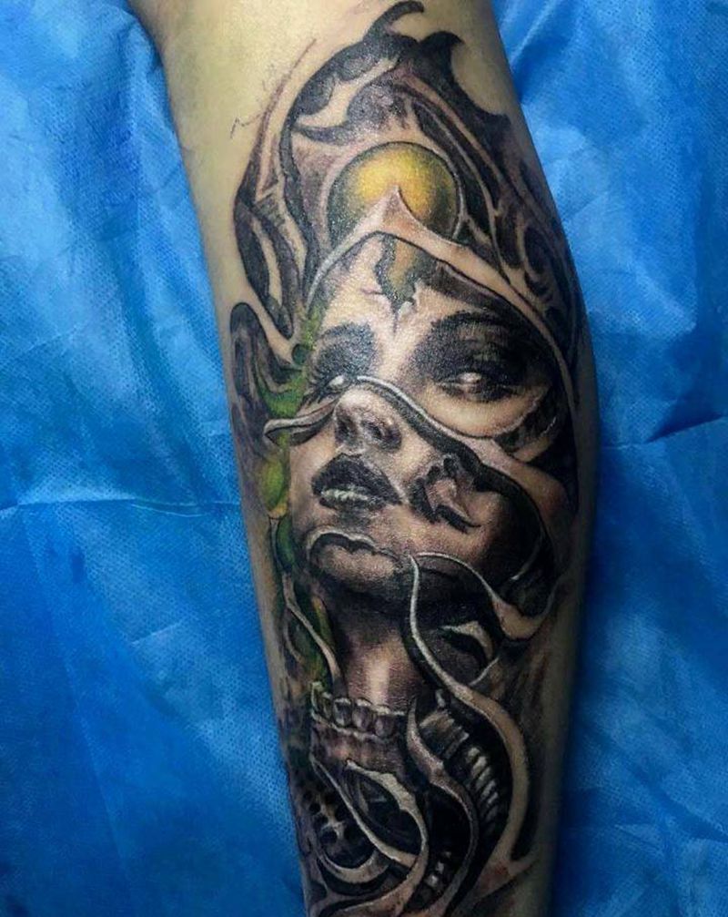 骷髅与女人纹身图片_腿部纹身图案