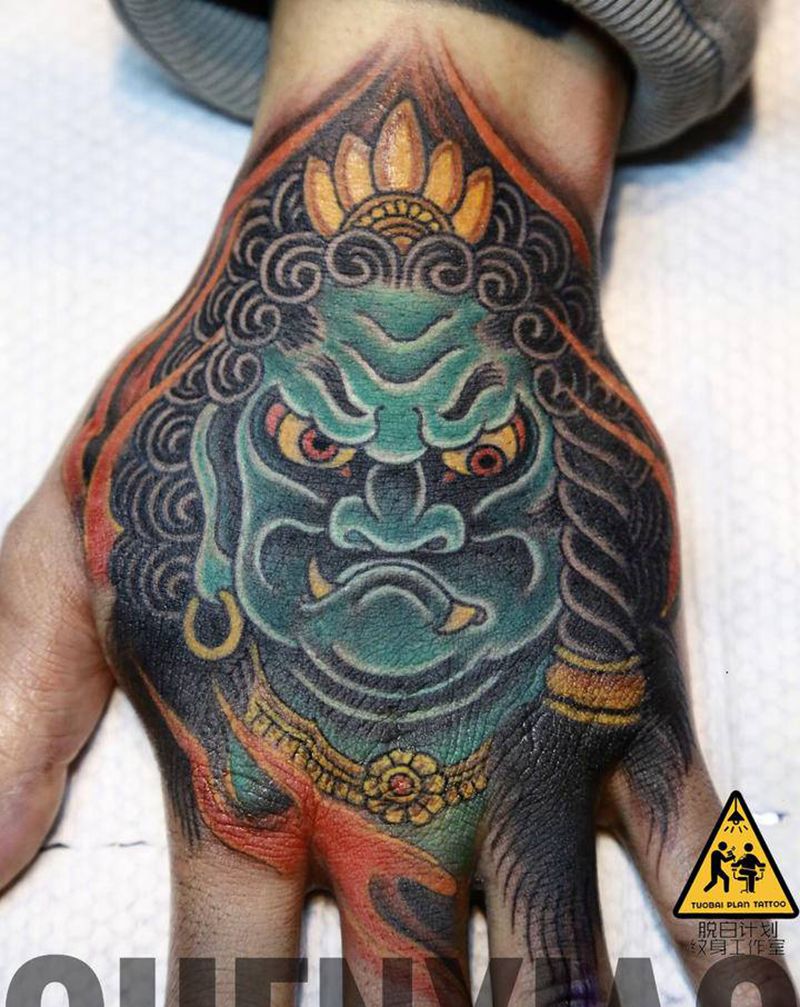 不动纹身图片_手部老传统纹身图案