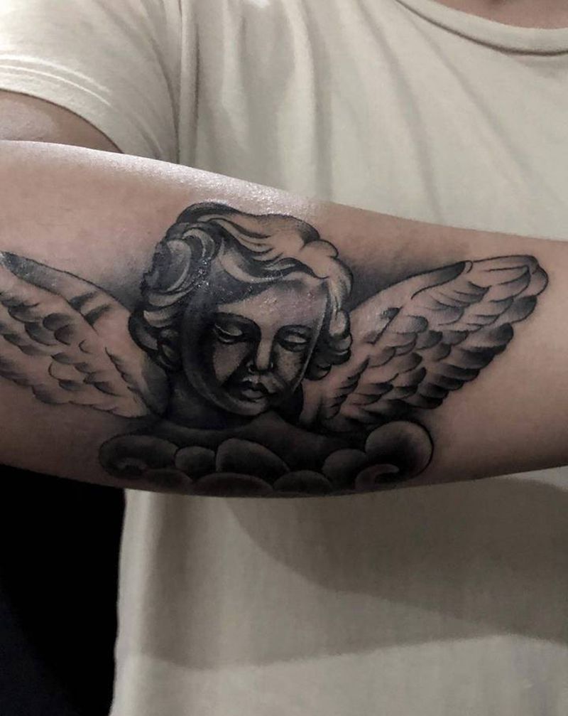 丘比特纹身图片_手臂欧美写实纹身图案