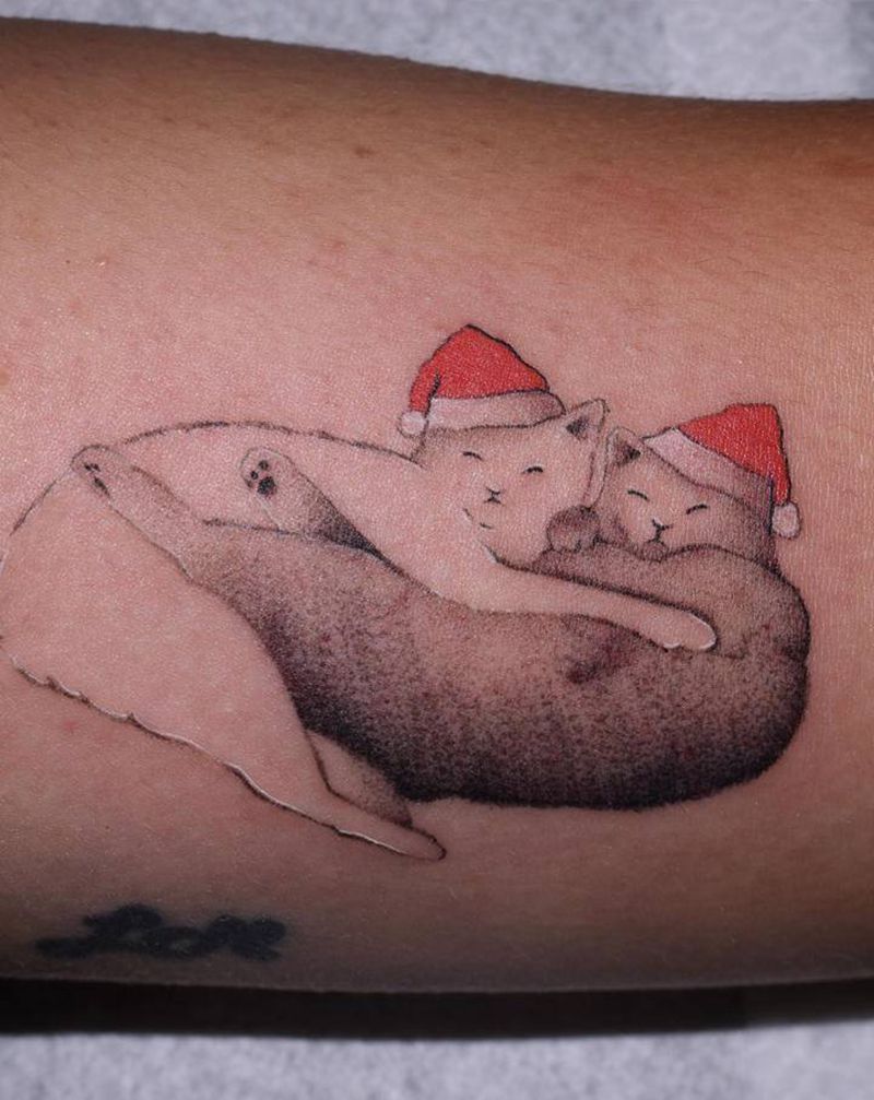圣诞猫纹身图片_手部点刺纹身图案
