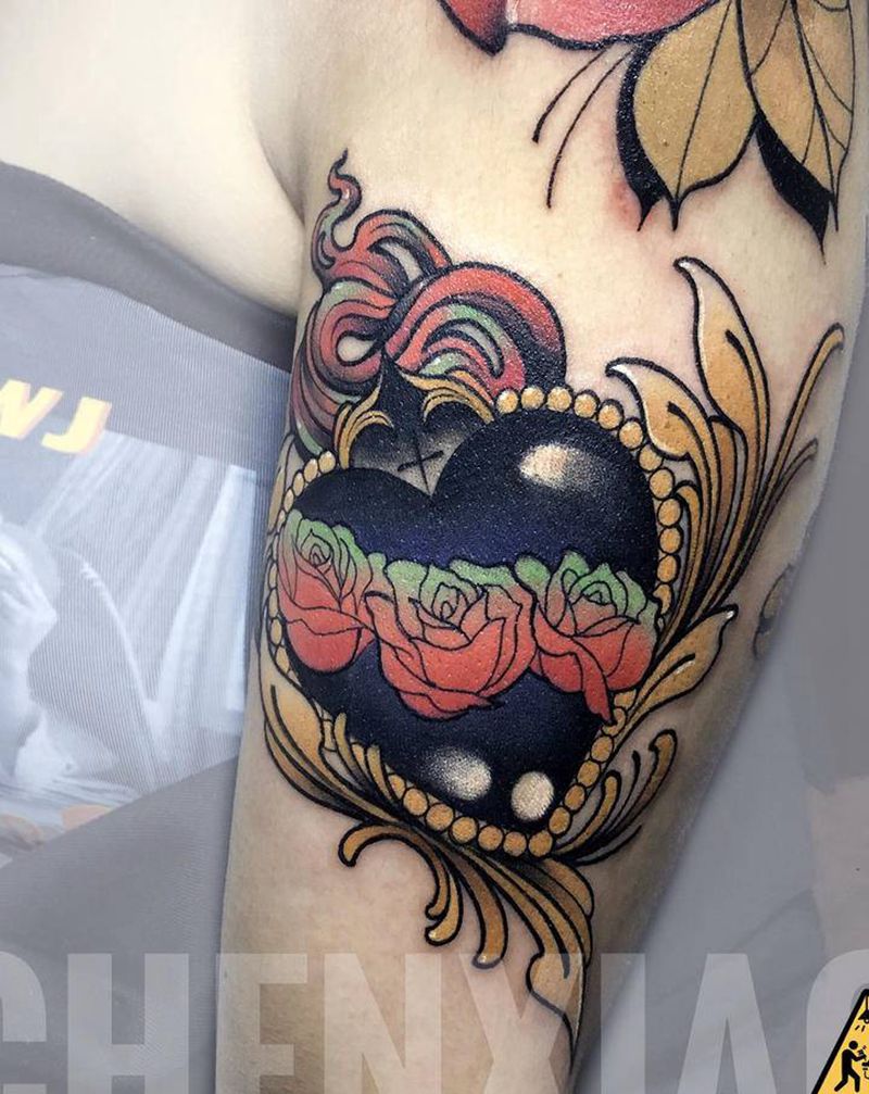 耶稣的心脏纹身图片_手臂手部New School纹身图案