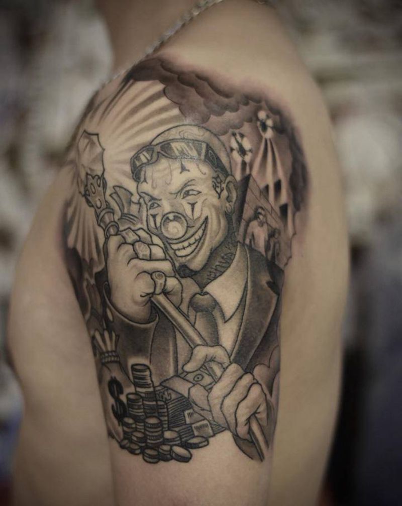 西海岸小丑纹身图片_手臂欧美写实纹身图案