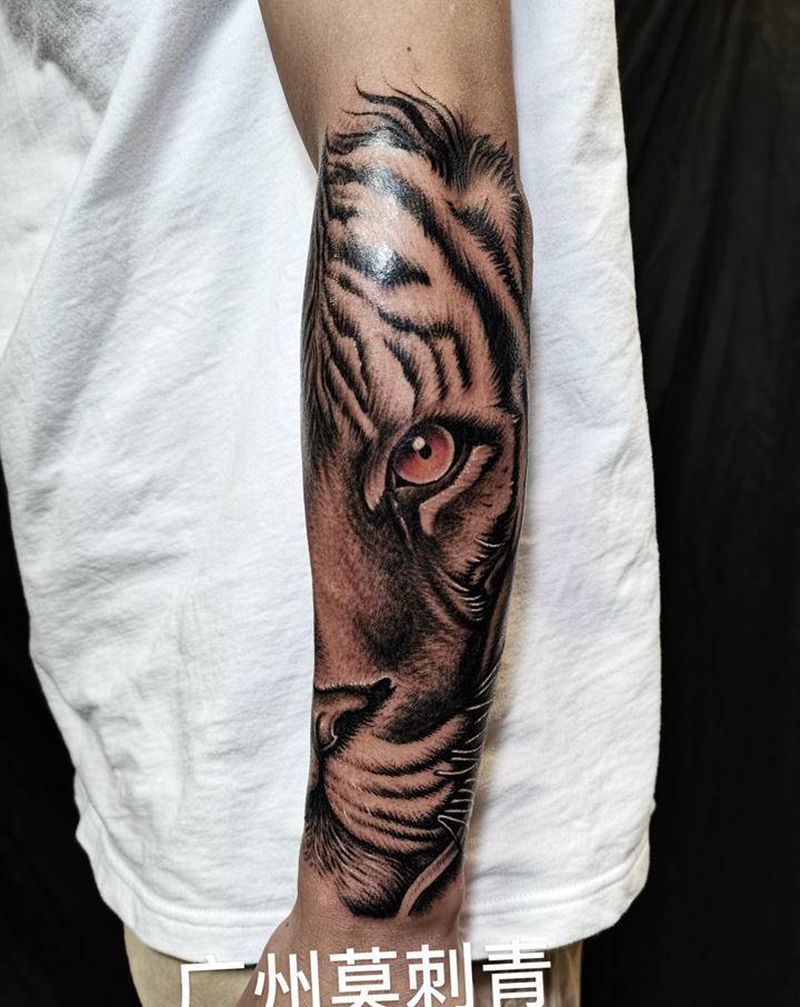 欧美小臂猛虎纹身图片_手部手臂欧美写实新传统虎纹身图案