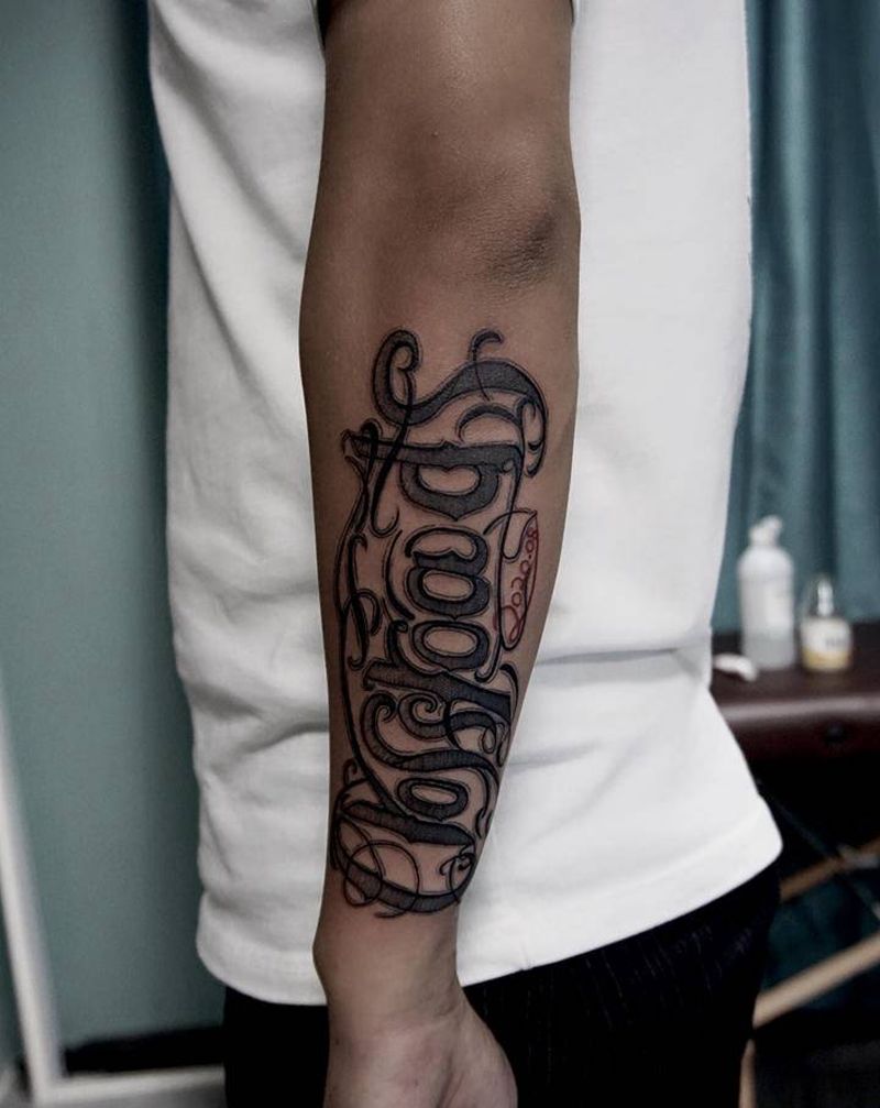 花体英文纹身图片_手臂花体字纹身图案