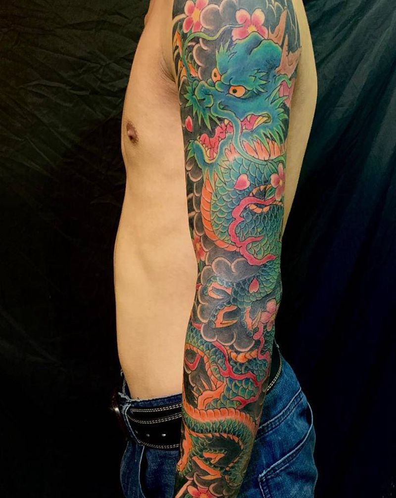 老传统花臂龙纹身图片_手部手臂新传统老传统花臂龙伤疤疤痕纹身图案
