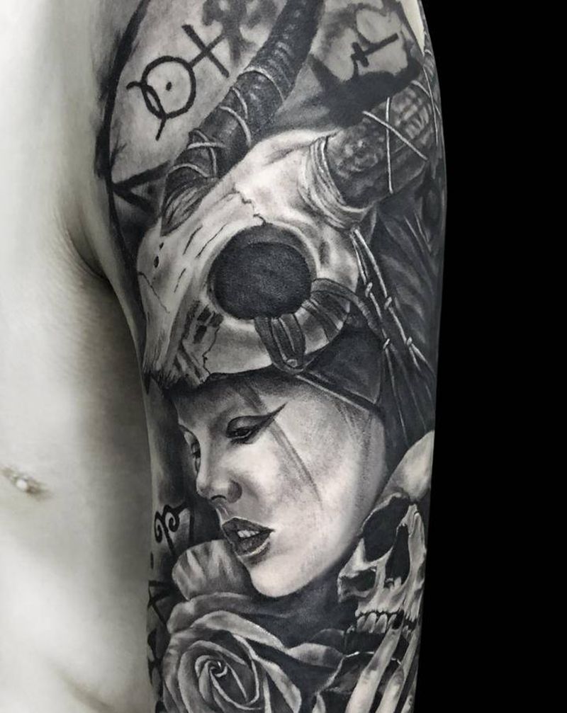 一个花臂的开始纹身图片_手臂欧美写实纹身图案