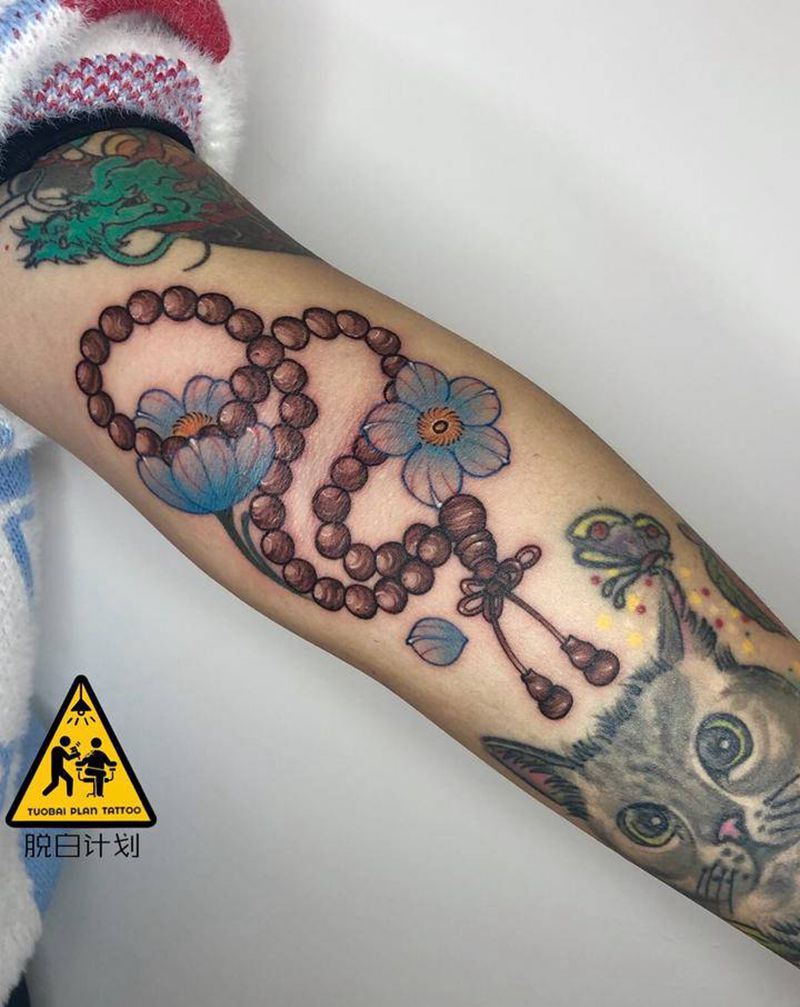 佛珠&榛果纹身图片_手部手臂New School纹身图案