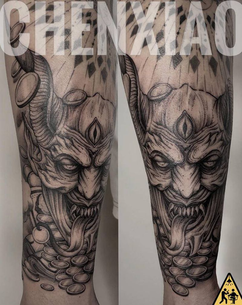 敛财的恶魔纹身图片_手部手臂恶魔纹身图案