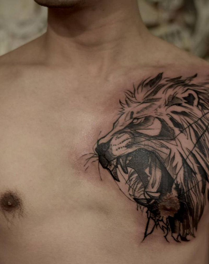 半胸狮子纹身图片_胸部几何图腾纹身图案