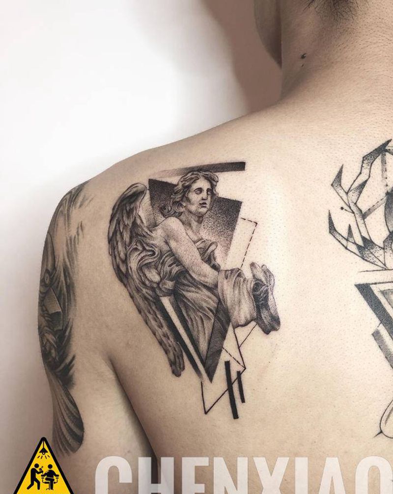 天使&恶魔纹身图片_背部几何欧美写实纹身图案