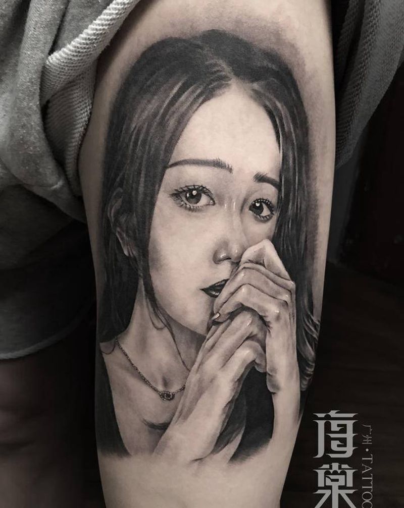 客人女朋友纹身图片_腿部欧美写实纹身图案