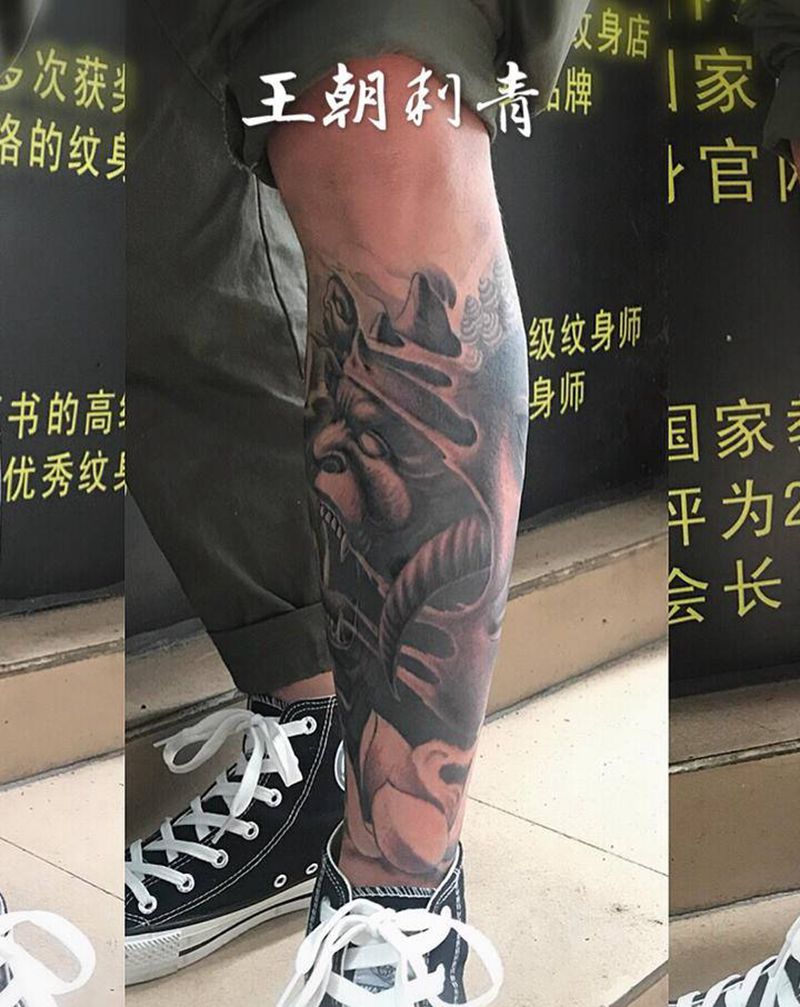 佛魔纹身图片_腿部新传统小腿佛魔纹身图案