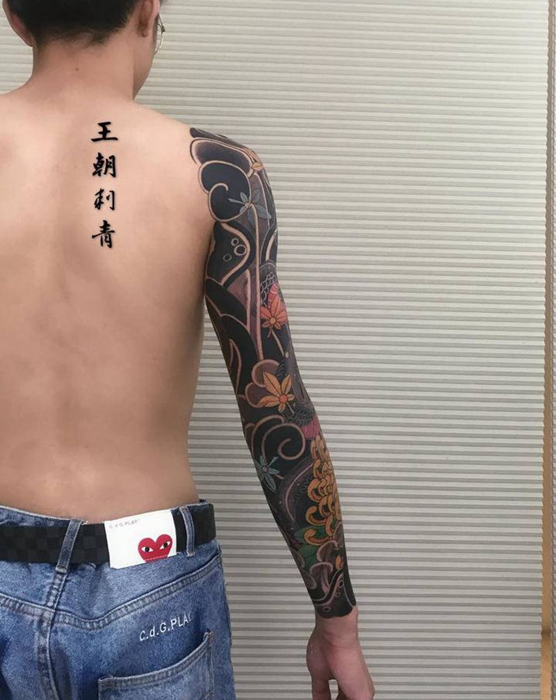 老传统花臂纹身图片_手臂老传统蛇菊花老传统纹身图案