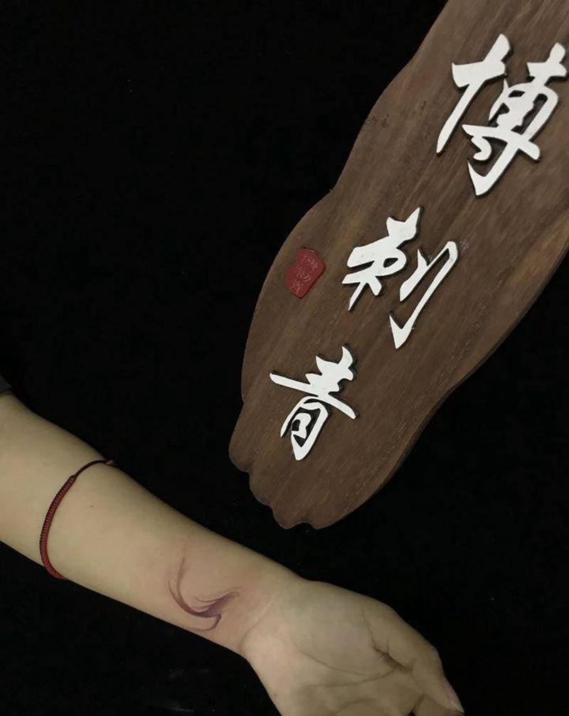 小鱼纹身图片_手臂水彩纹身图案