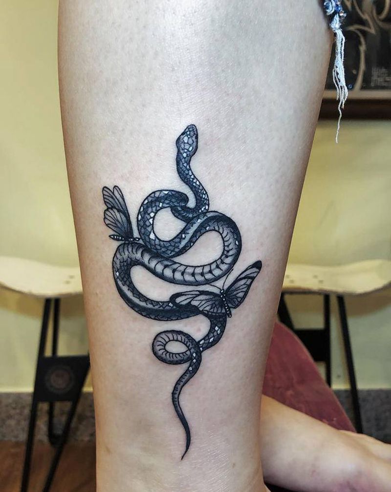 蛇纹身图片_腿部点刺纹身图案