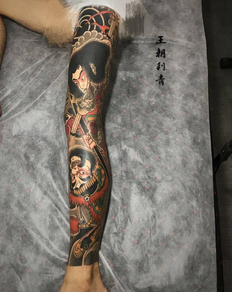 老传统花腿纹身图片_腿部老传统九纹龙纹身图案