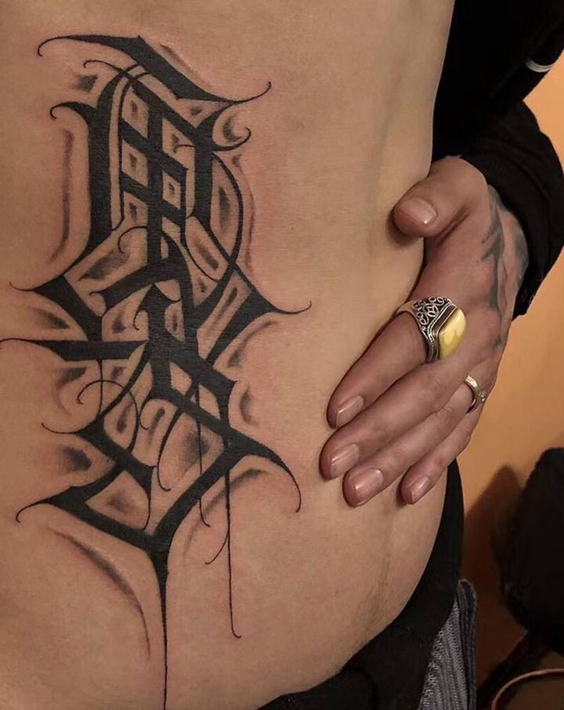 永夜刺青纹身图片_腰部纹身图案