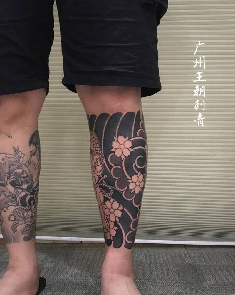 老传统纹身图片_腿部老传统招财猫达摩纹身图案