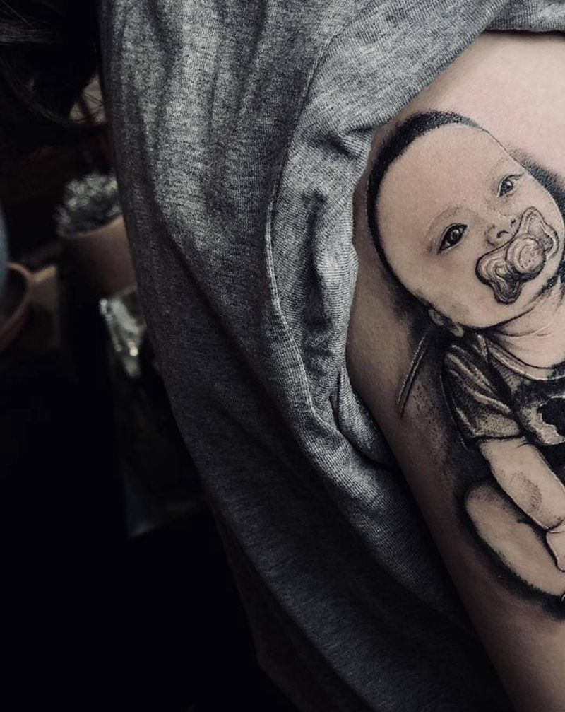 母爱纹身图片_手臂欧美写实点刺纹身图案