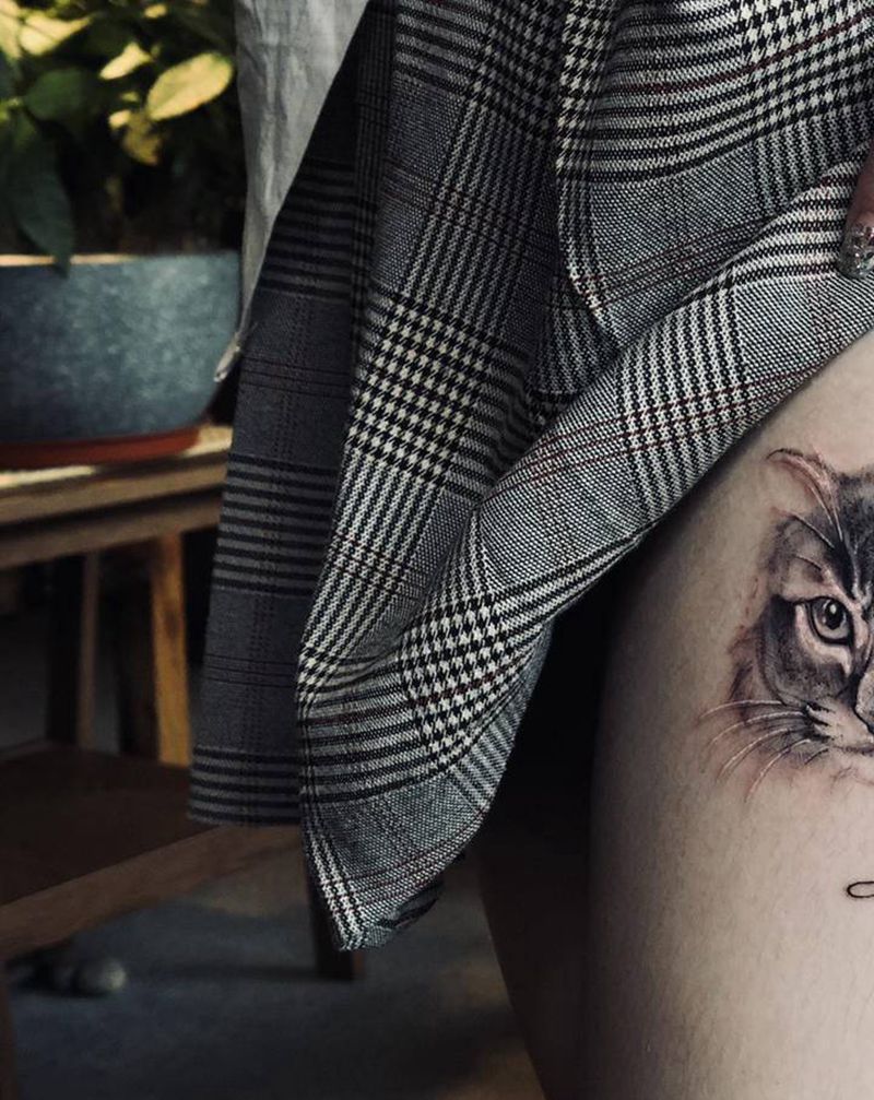 小猫咪纹身图片_腿部点刺欧美写实纹身图案