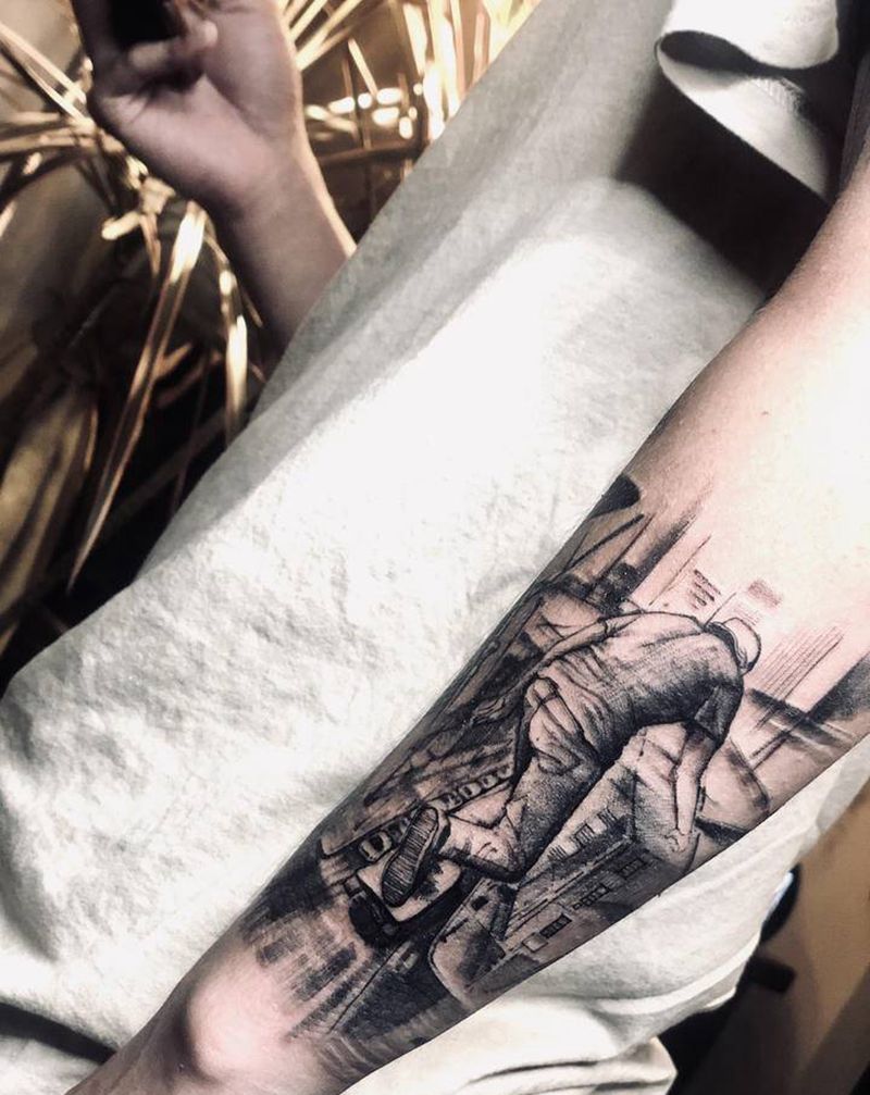 滑板少年未完纹身图片_手臂点刺几何纹身图案