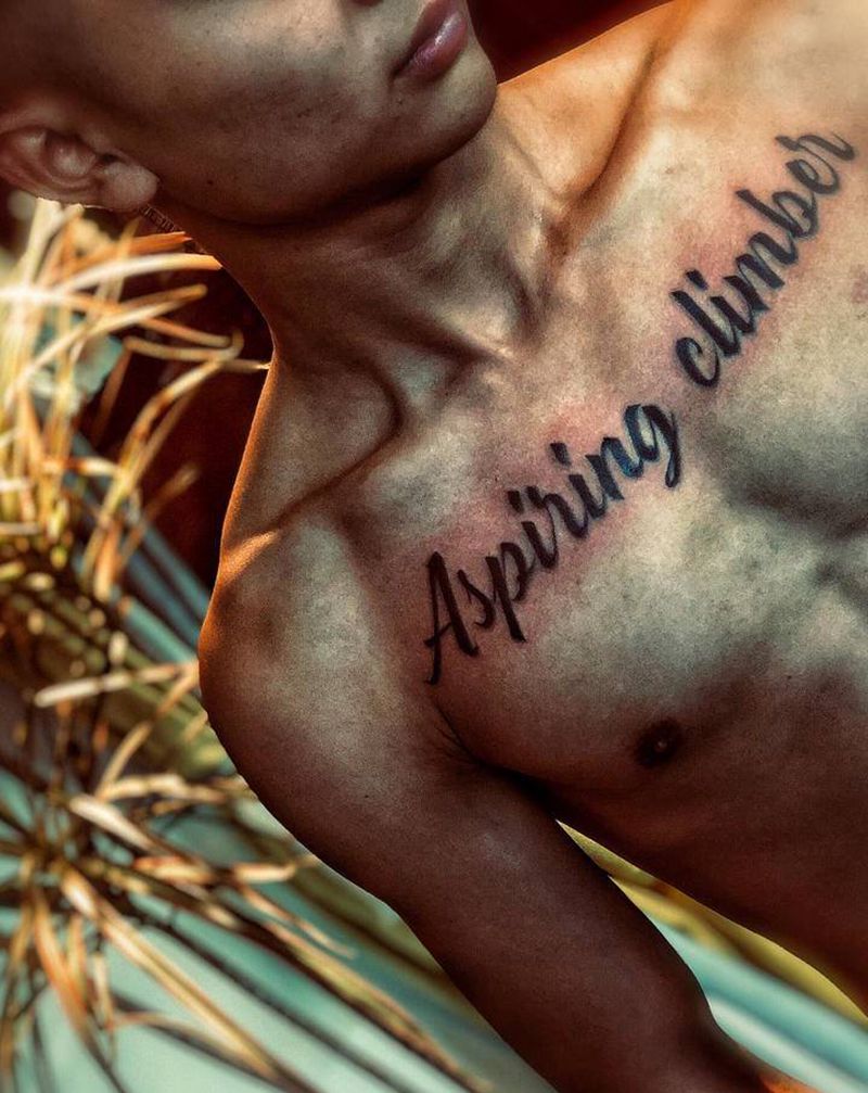 攀登者纹身图片_胸部花体字纹身图案