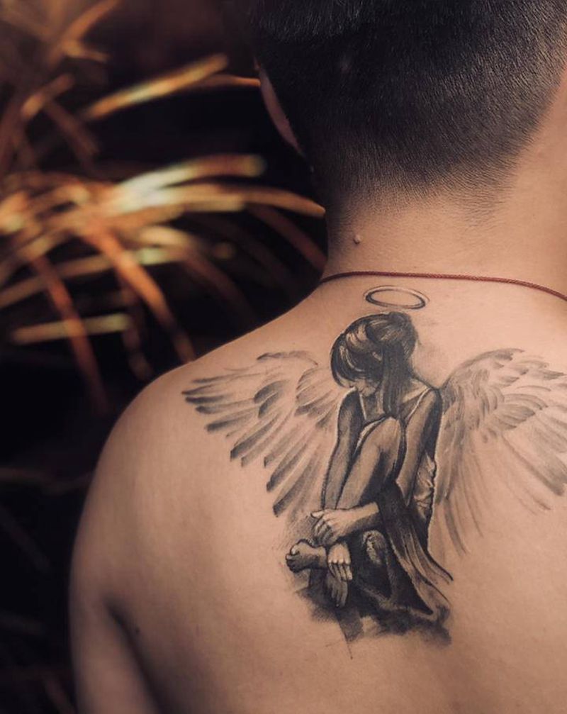 恢复后效果纹身图片_背部欧美写实点刺纹身图案