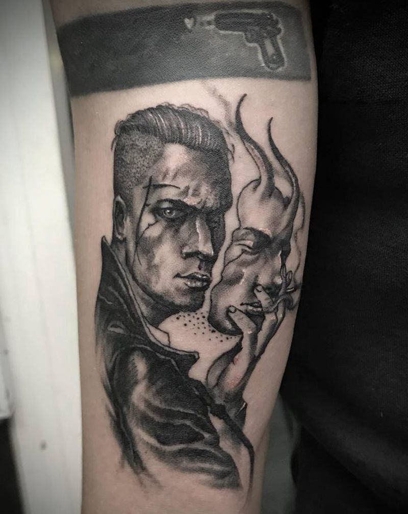 救赎者纹身图片_手臂欧美写实纹身图案