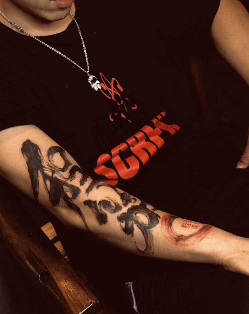 水墨纹身图片_手臂水墨纹身图案