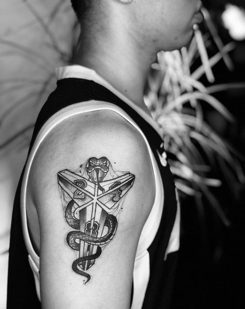 黑曼巴纹身图片_手臂点刺New School纹身图案