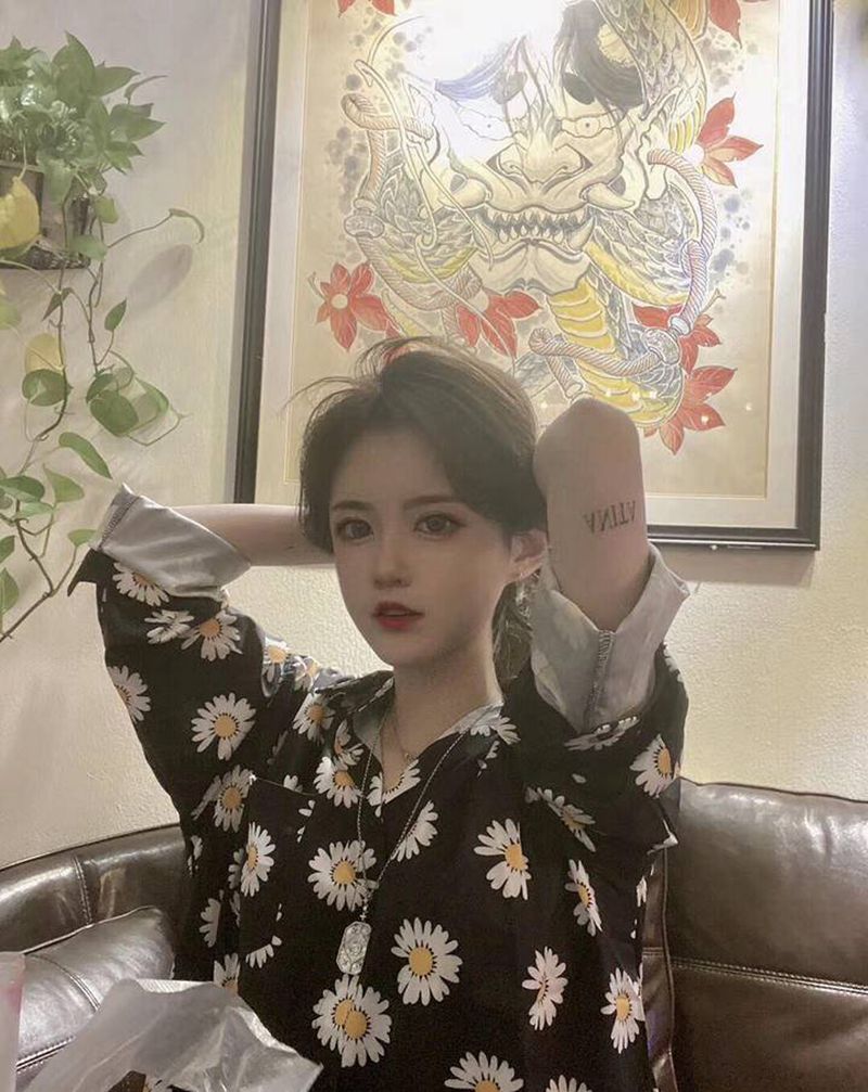 网红小姐姐纹身图片_手臂点刺纹身图案