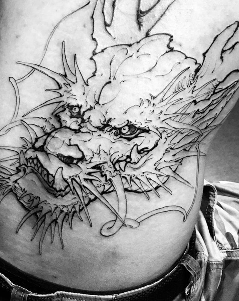 新传统龙未完纹身图片_背部新传统纹身图案