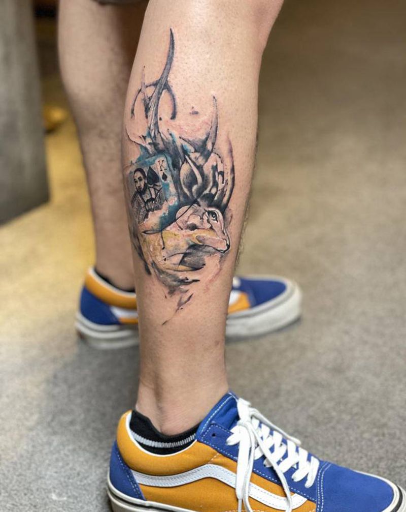 麋鹿纹身图片_腿部水墨点刺纹身图案