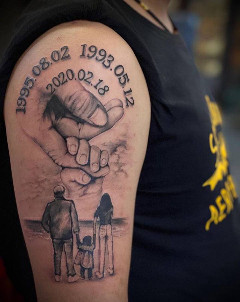 三口之家纹身图片_手臂欧美写实纹身图案