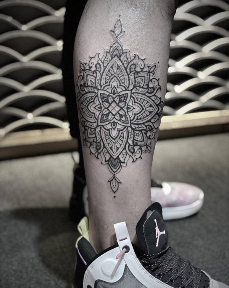 曼陀罗花纹身图片_手臂点刺几何纹身图案