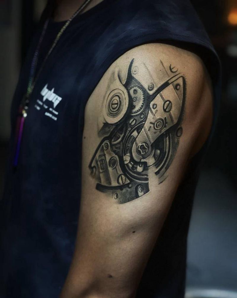 机械恢复后纹身图片_手臂欧美写实纹身图案