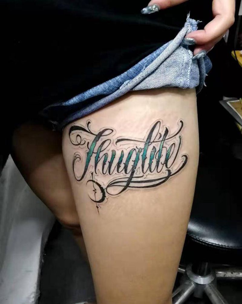 花体英文纹身图片_腿部纹身图案