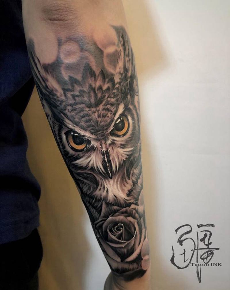 貓頭鷹纹身图片_手臂手部欧美写实纹身图案