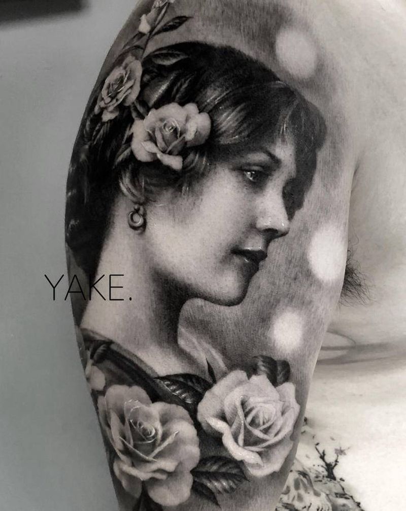 茶花女纹身图片_手臂欧美写实纹身图案