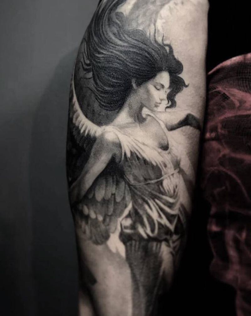 .纹身图片_手臂欧美写实纹身图案